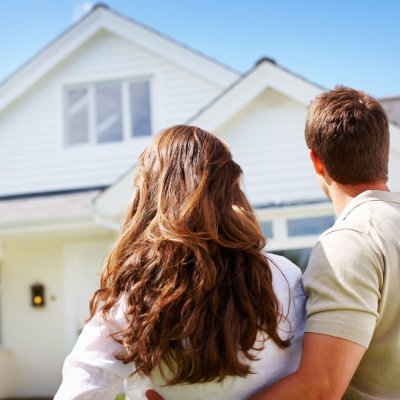 100391705-young-couple-in-front-home-gettyp-2048